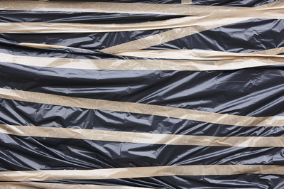 black-plastic-protection-with-adhesive-tape-stora-2021-08-26-18-12-27-utc